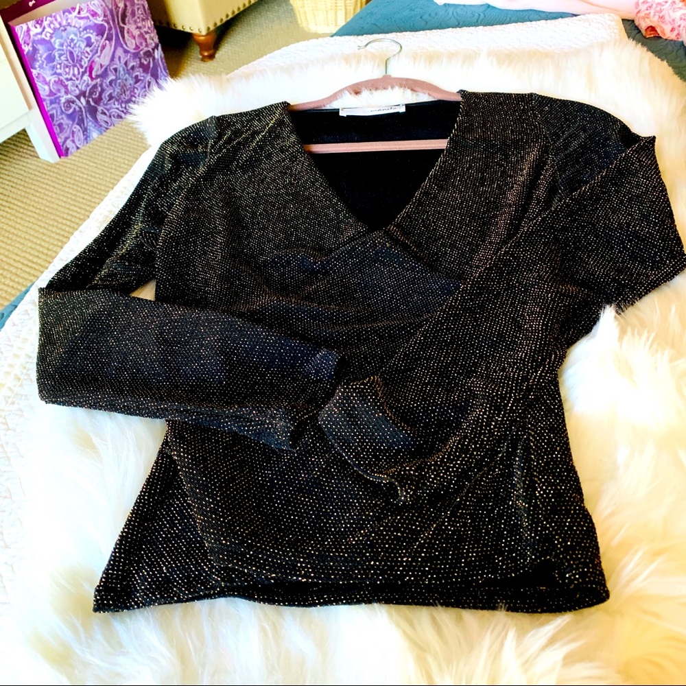 Dramatic sexy metallic crossover knit top